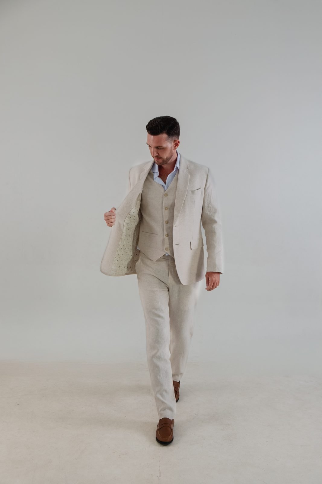 Cream linen three-piece suit by STUDIOSUMA, Bali